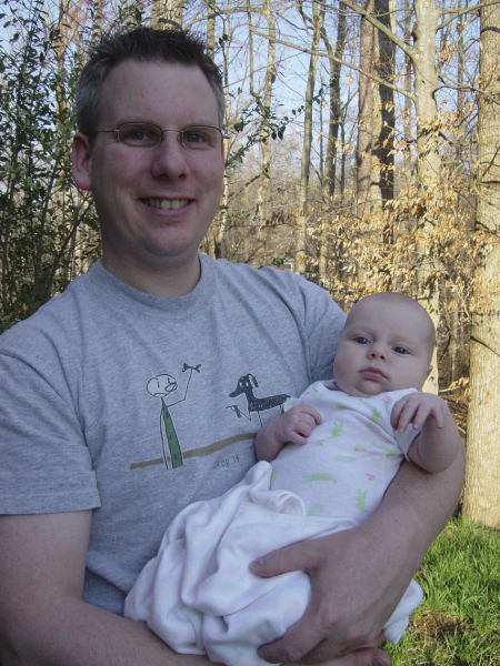 Bill holding outdoors