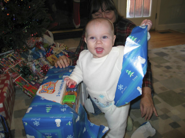 smile holding wrapping paper